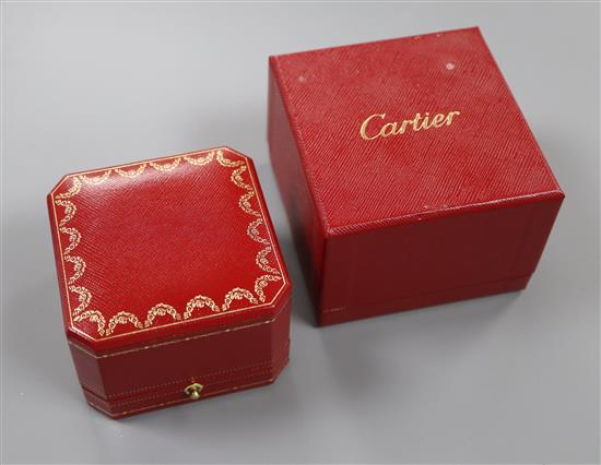 A modern Cartier jewellery box and outer box.